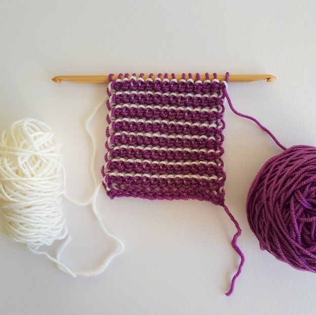 More purple yarn on the other side of the sample. 