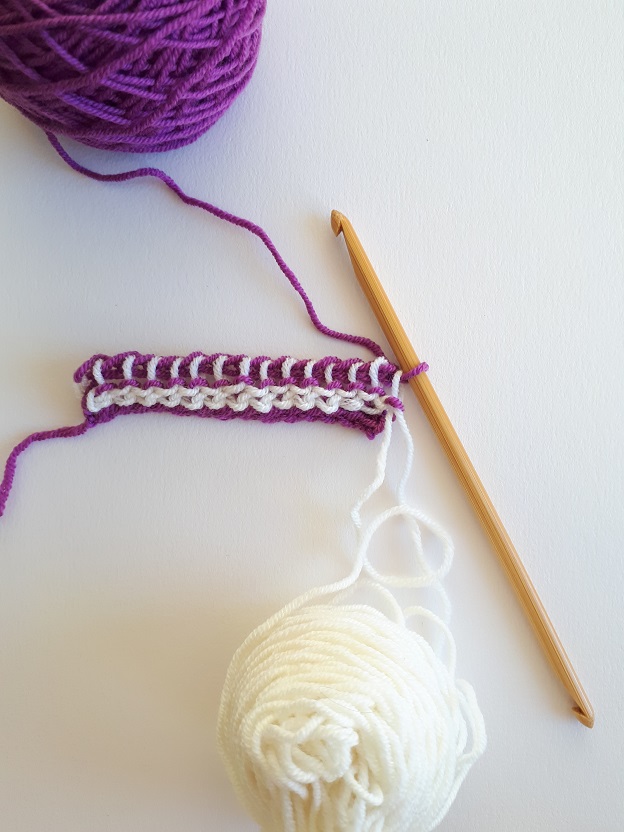 Yarn over and pull yarn through 2 loops until there is only 1 loop left on the hook. 