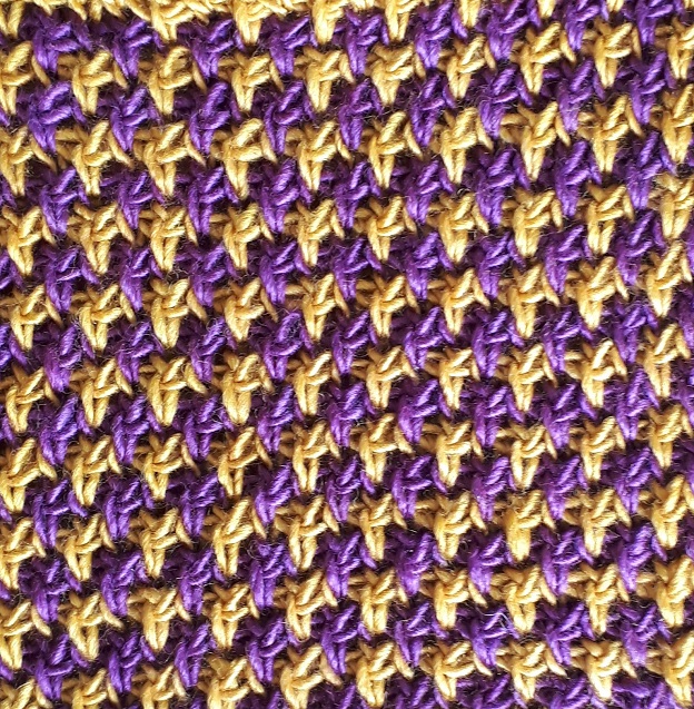 Color change with Tunisian knit stitch and twisted down simple stitch