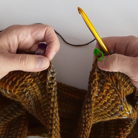 Add stitches to shape the underarm of a top down sweater in Tunisian crochet